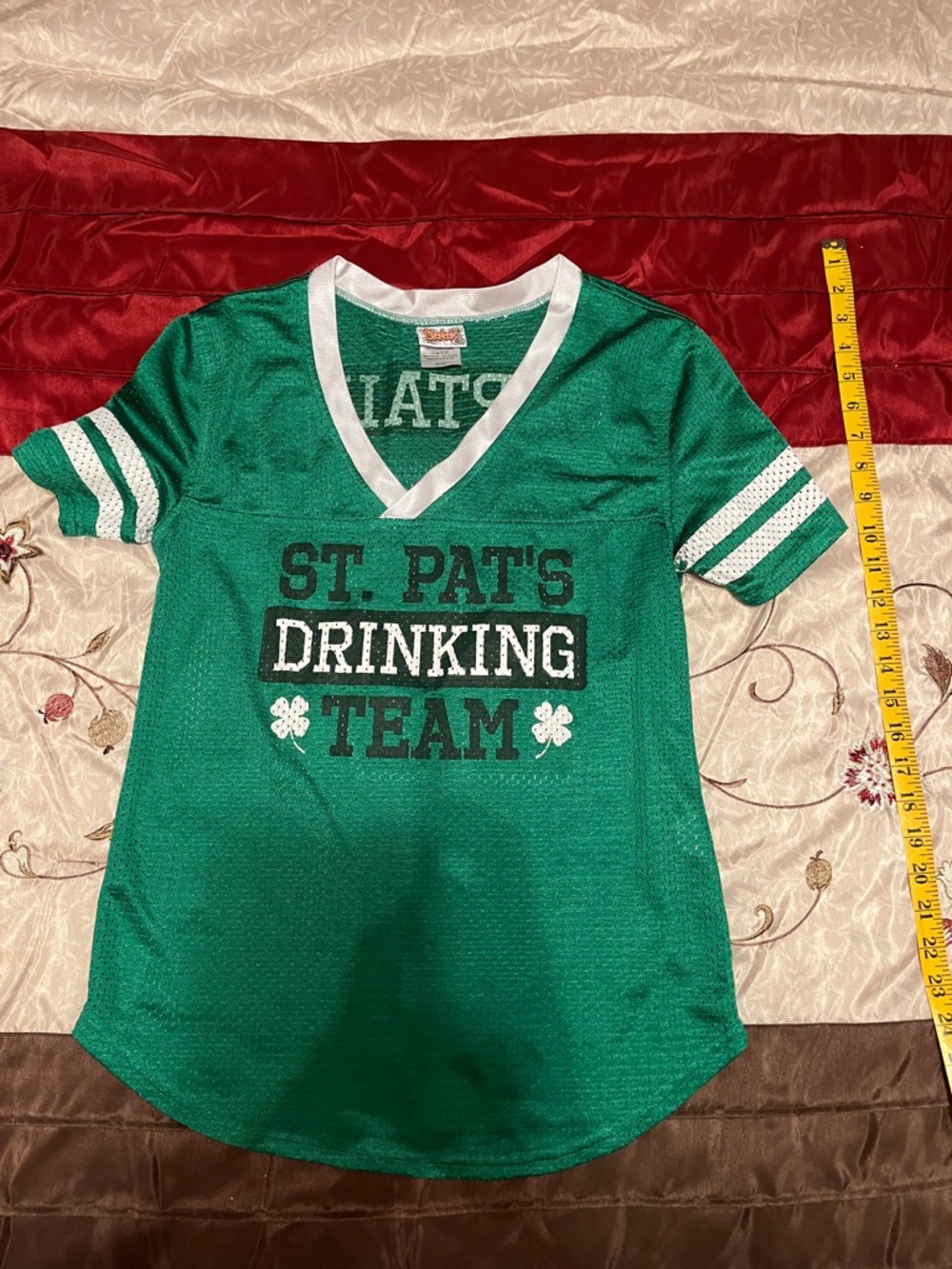 Spencer's Green V-Neck "St. Pat's Drinking Team" jersey material